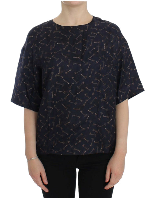 Dolce & Gabbana Blaue Seidenbluse mit goldenem Schlüsseldruck
