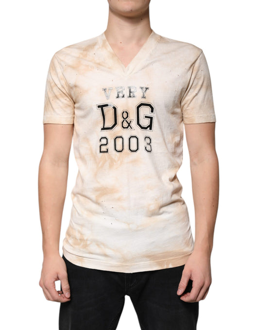 Dolce & Gabbana Beiges Baumwoll-T-Shirt mit V-Ausschnitt und grafischem Print
