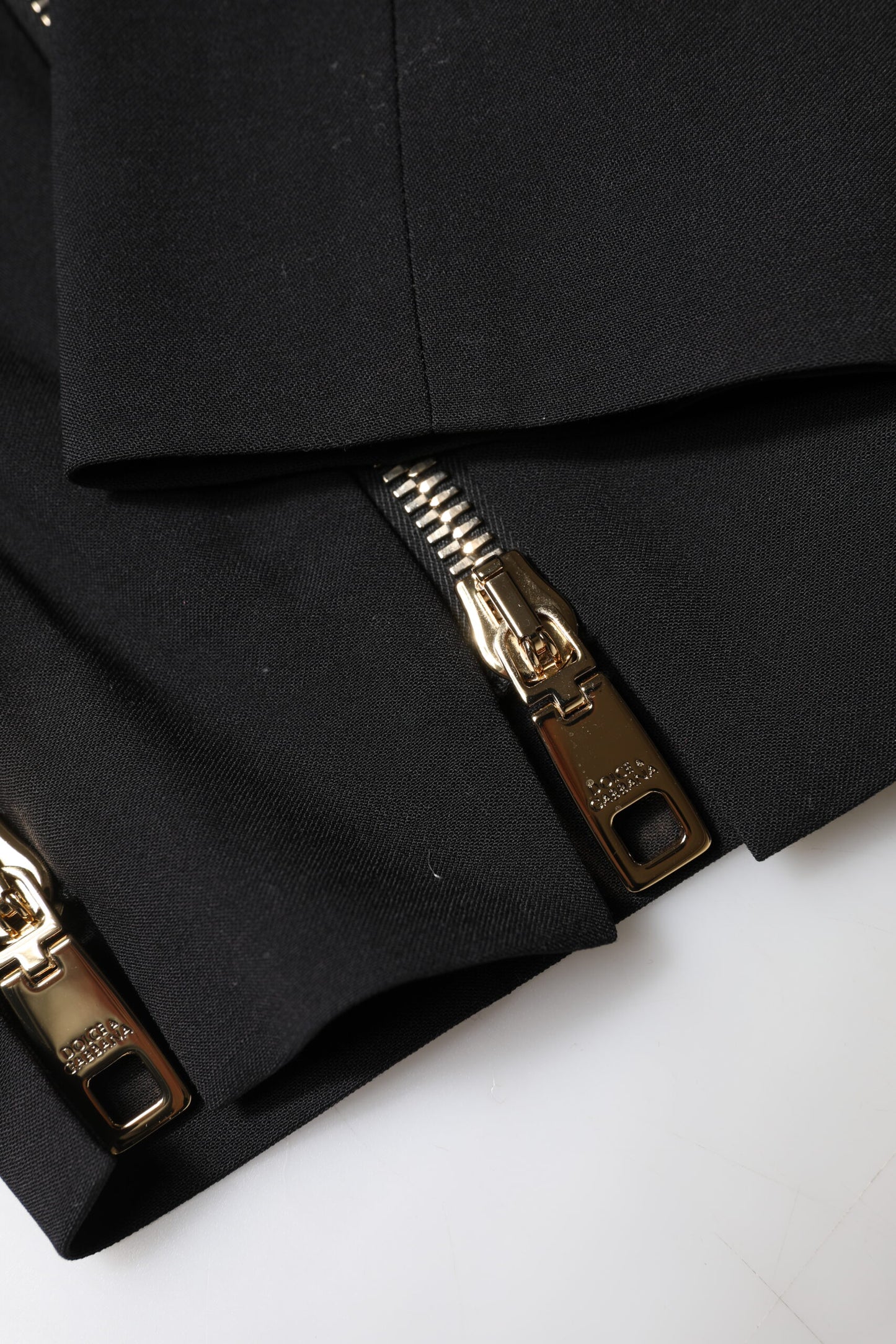 Dolce & Gabbana – Schwarze, hoch taillierte Karottenhose aus Wolle mit Reißverschluss