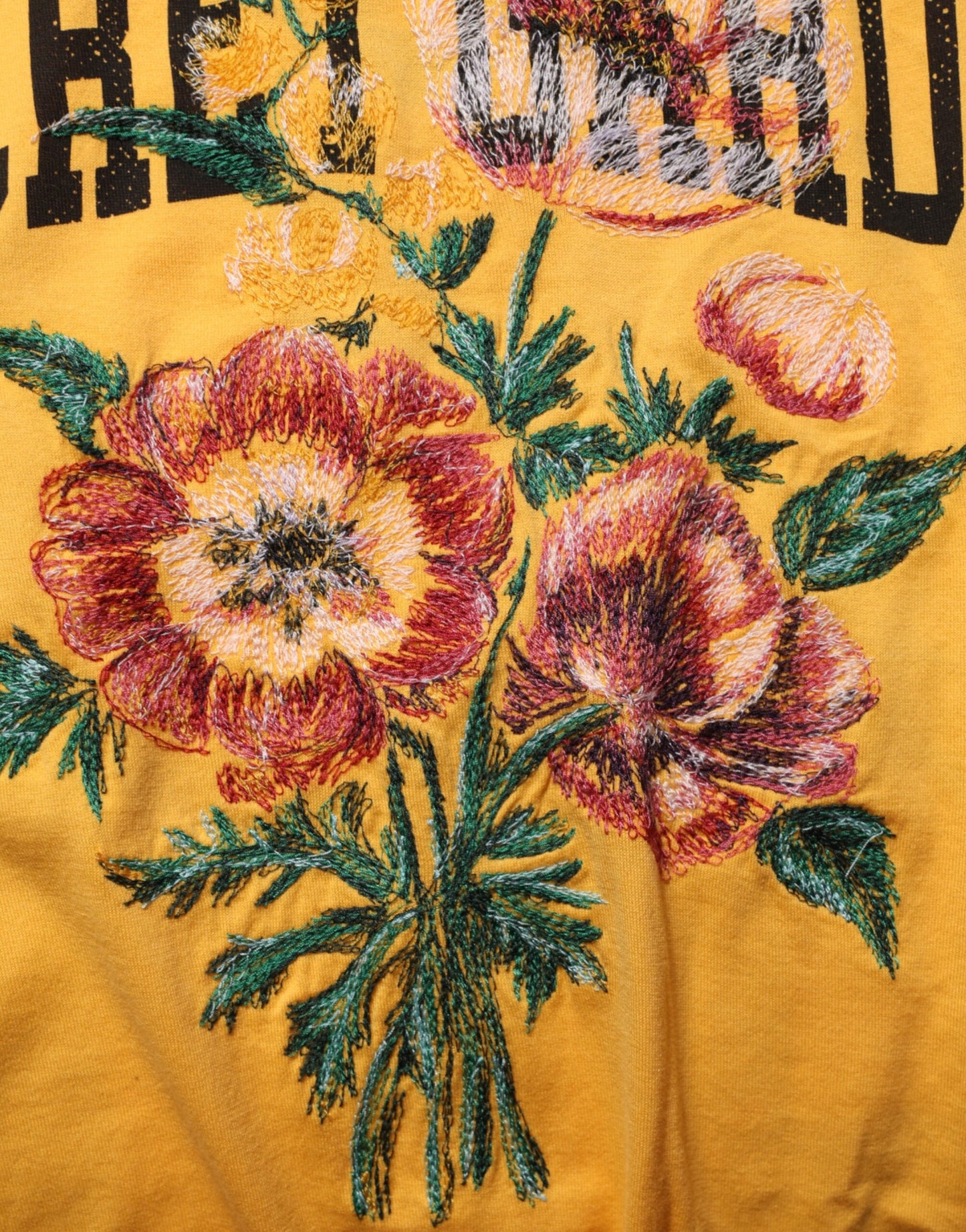 Dolce & Gabbana Gelbes T-Shirt mit Rundhalsausschnitt aus Baumwolle mit Blumenmuster „Secret Graden“