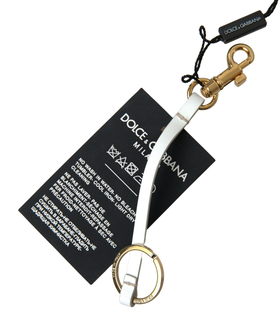 Dolce & Gabbana Schlüsselanhänger aus schwarzem Silikon mit DG-Logo und goldenem Messing
