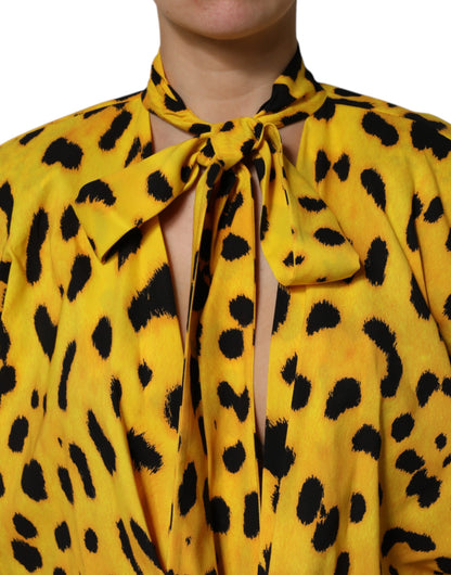 Dolce &amp; Gabbana – Gelbes Jumpsuit-Kleid mit langen Ärmeln und Leopardenmuster