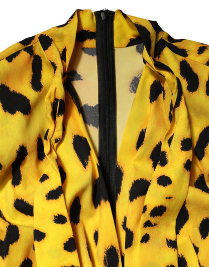 Dolce &amp; Gabbana – Gelbes Jumpsuit-Kleid mit langen Ärmeln und Leopardenmuster
