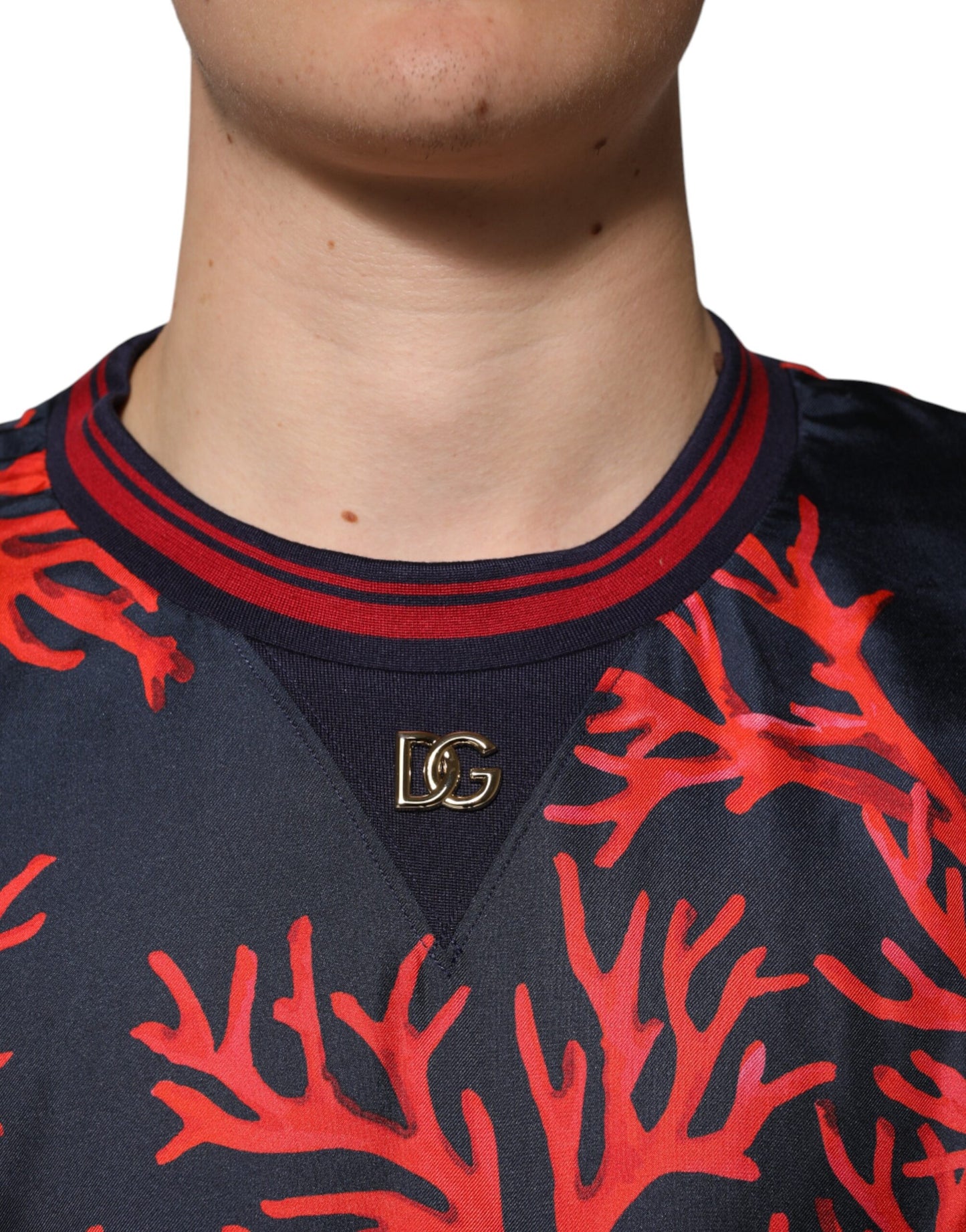 Dolce &amp; Gabbana Marineblauer Pullover aus Seide mit Korallendruck